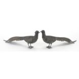 Pair of unmarked silver pheasants, 27cm in length, 154.0g