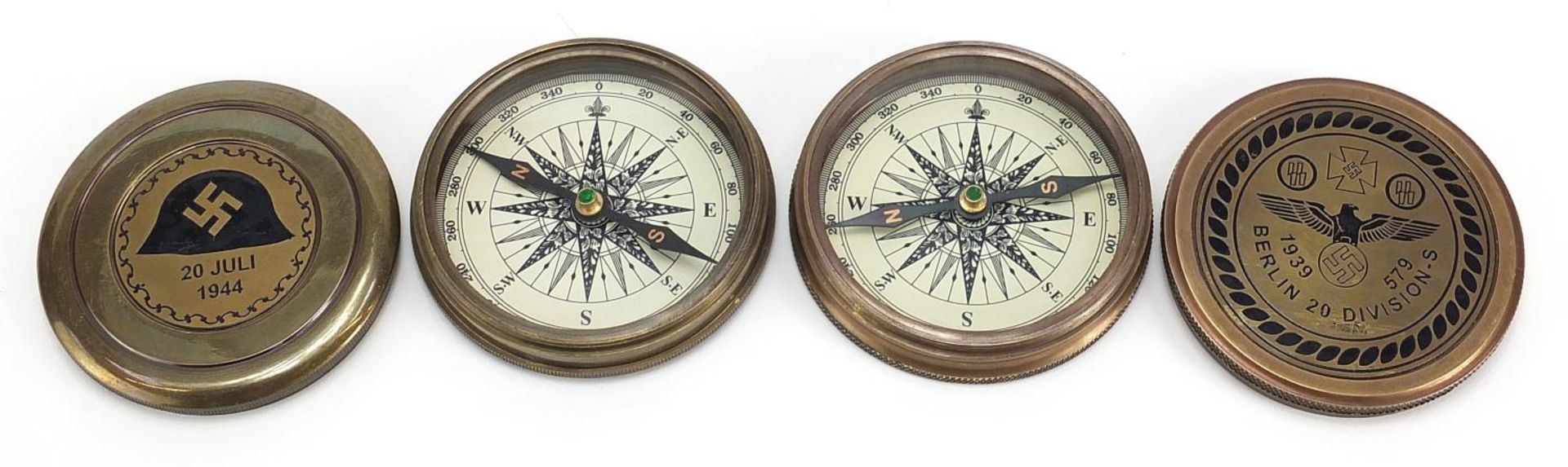 Two German military interest brass compasses, each 7.5cm in diameter