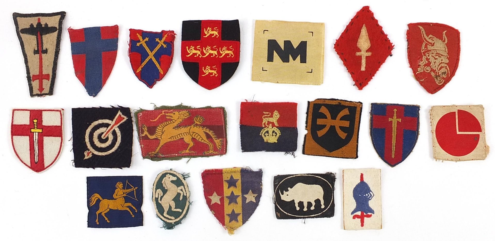 Ninteen Military interest cloth badges including East Anglian District Eastern Command, 12th