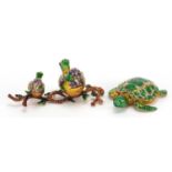 Two jewelled and enamel gilt metal trinkets in the form of birds on a branch and a sea turtle, the