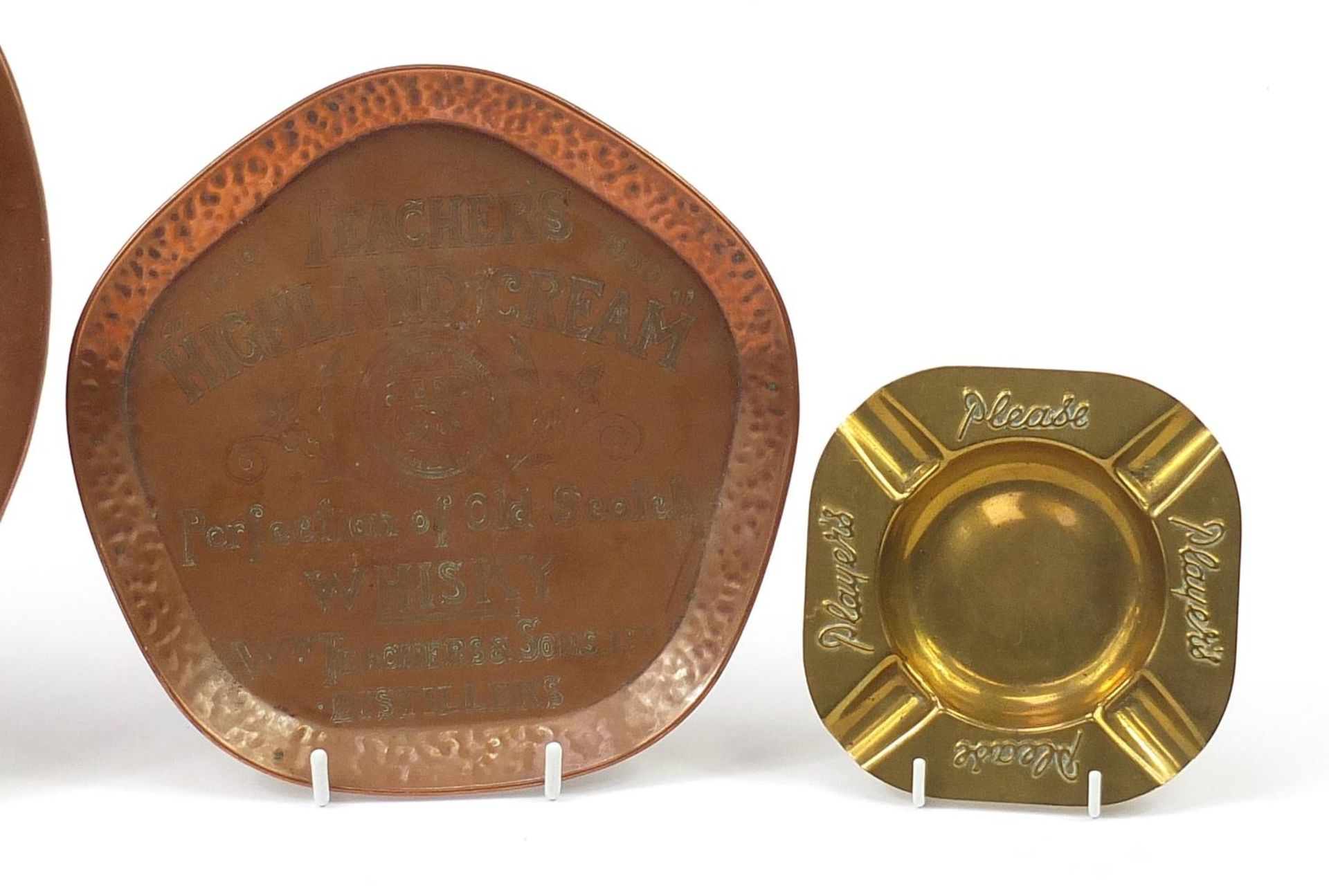 Four copper and brass advertising trays and ashtrays comprising Johnnie Walker, Teacher's Highland - Image 3 of 4