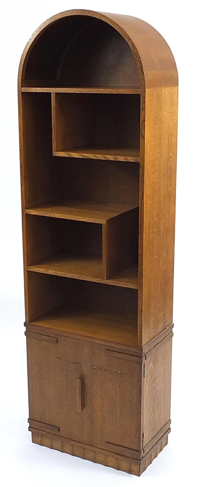 Manner of Heals, Art Deco oak dome topped open bookcase with cupboard base, 168cm H x 50.5cm W x - Image 2 of 4