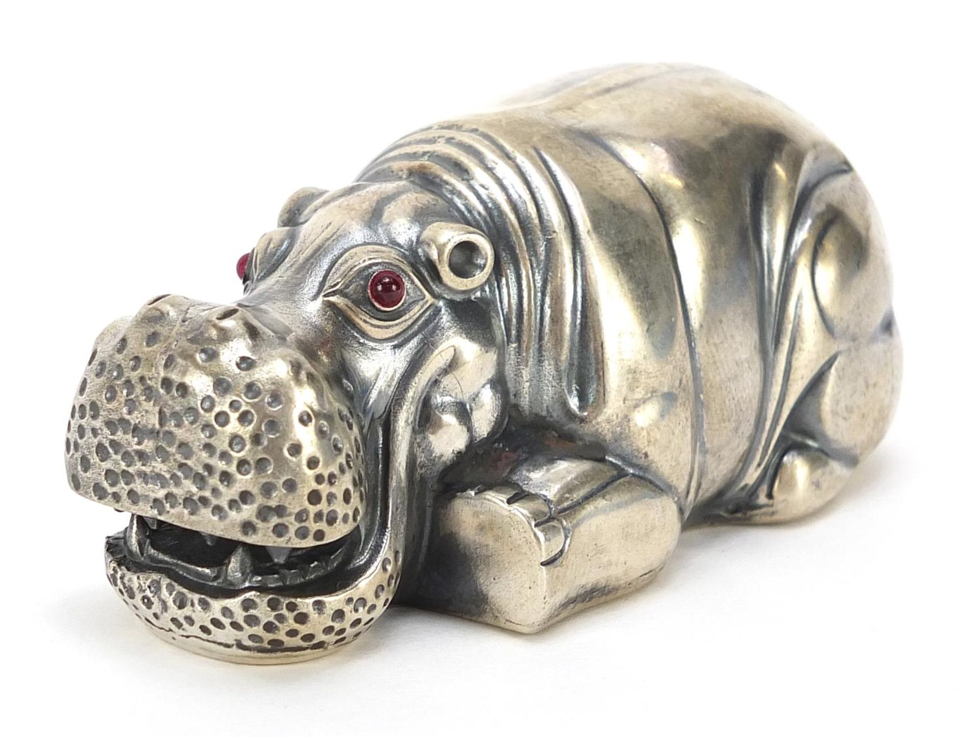 Silver hippopotamus with ruby eyes, impressed Russian marks, 7.5cm in length, 76.6g