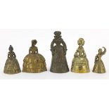 Five 19th century and later brass table bells in the form of females including one wearing Tudor