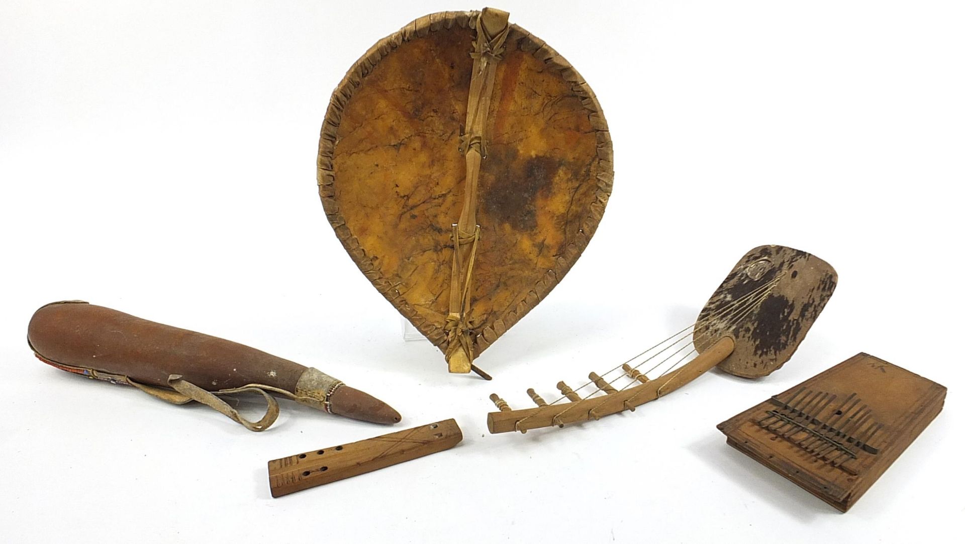 Tribal objects including a hand painted animal hide shield and musical instruments, the largest 50cm - Image 4 of 4