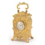 Miniature gilt brass Rococo style carriage clock, 8cm high