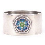 William Hair Haseler for Liberty, Art Nouveau circular silver and enamel napkin ring with stylised