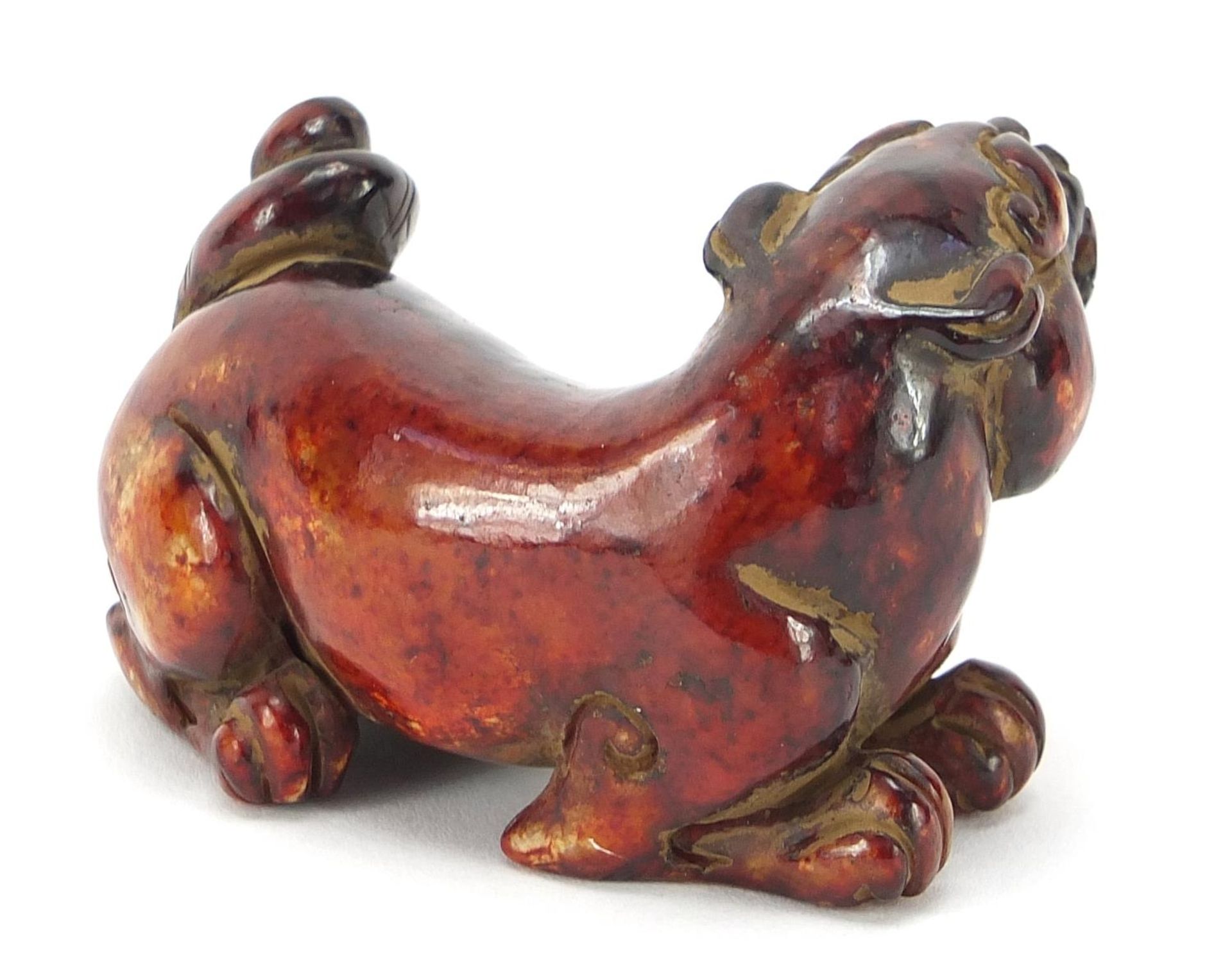 Chinese red stone carving of a mythical animal, 6.5cm in length - Image 2 of 3