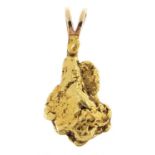 Heavy gold nugget pendant, the suspension loop marked 14k CASEY, 4cm high, 22.7g