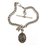 Silver watch chain with T bar and Victorian silver locket, 20cm in length, 31.8g