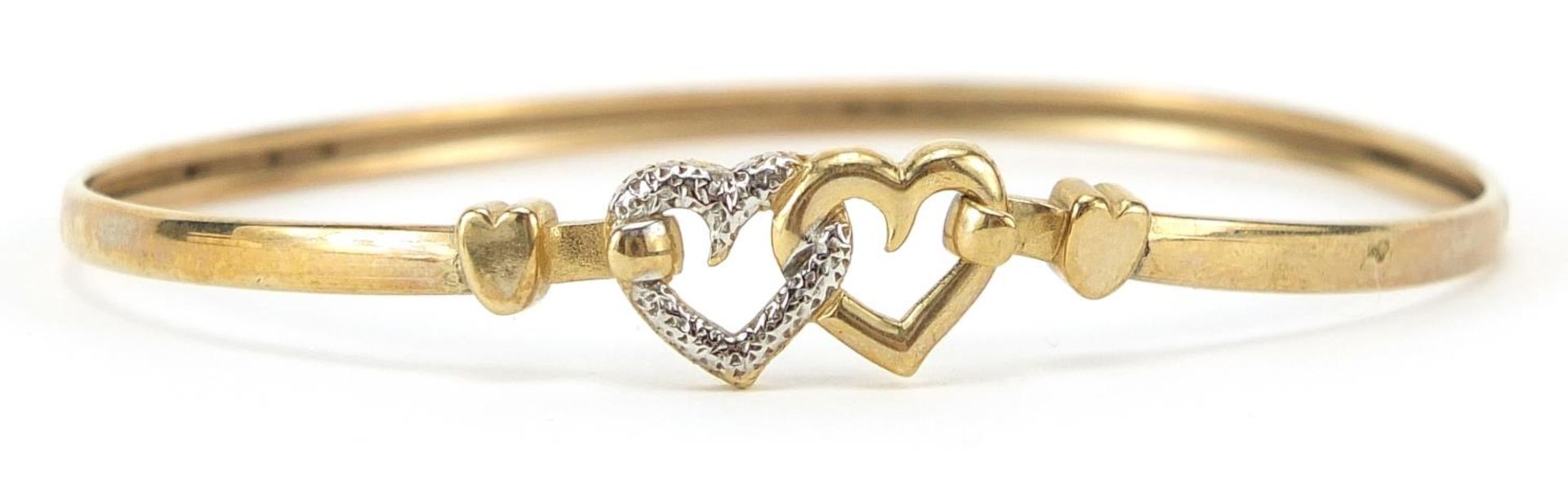 9ct gold love heart bangle, 5.9cm wide, 4.7g