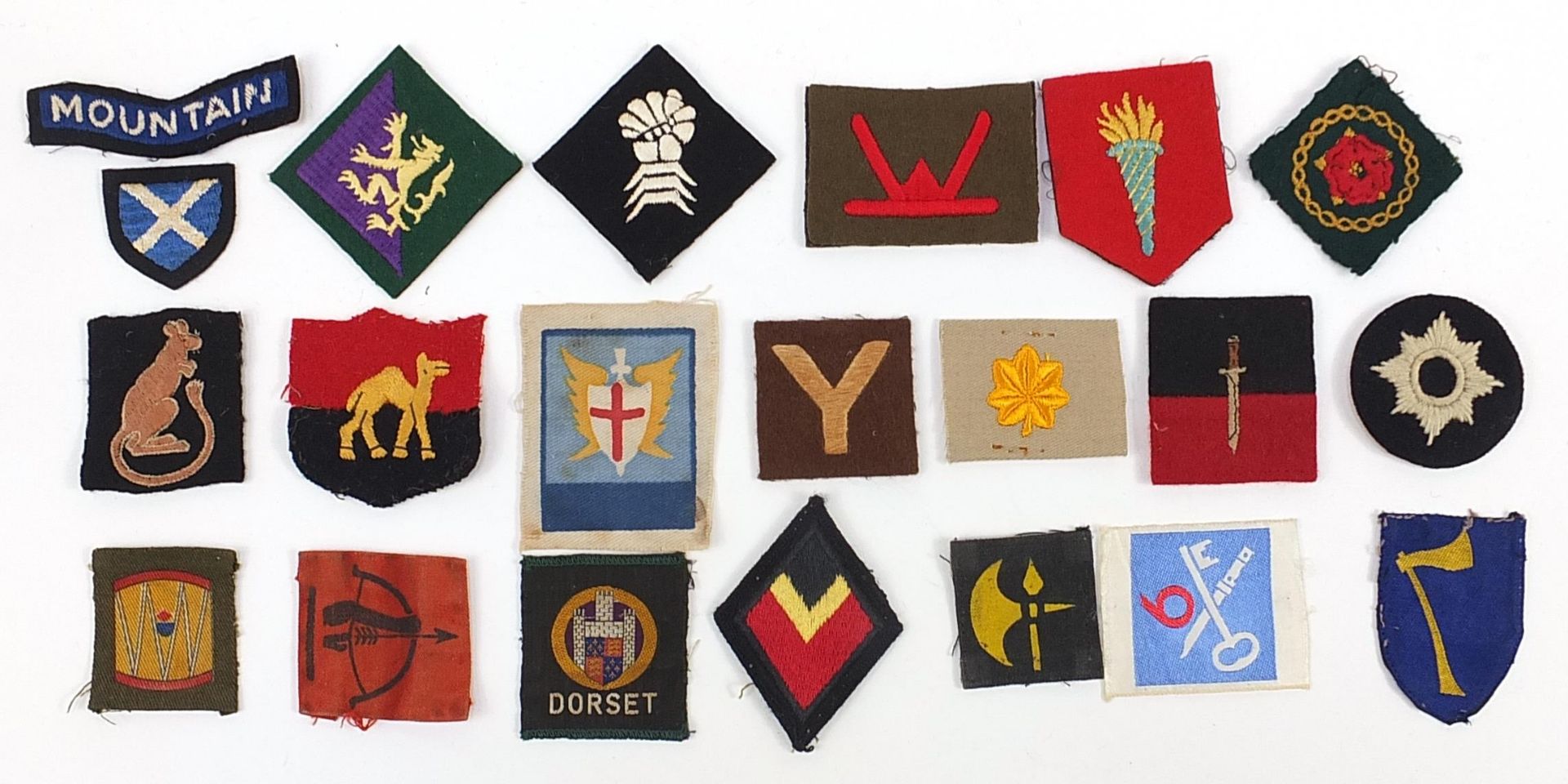 Twenty one Military interest cloth badges including 6th Armoured Division, 105th Coastal Brigade
