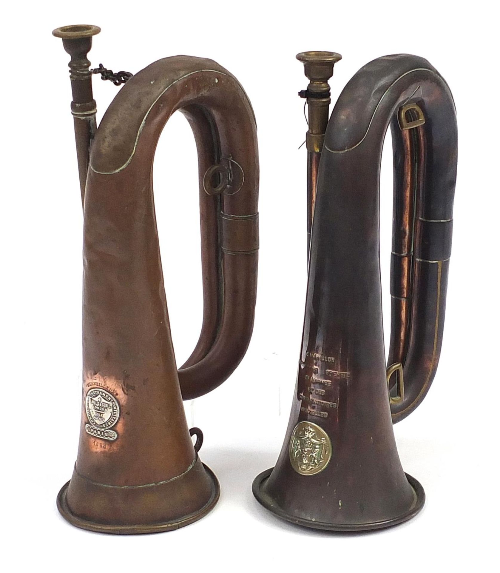 Two French copper and brass bugles comprising J Wallis & Son and C Mahillon