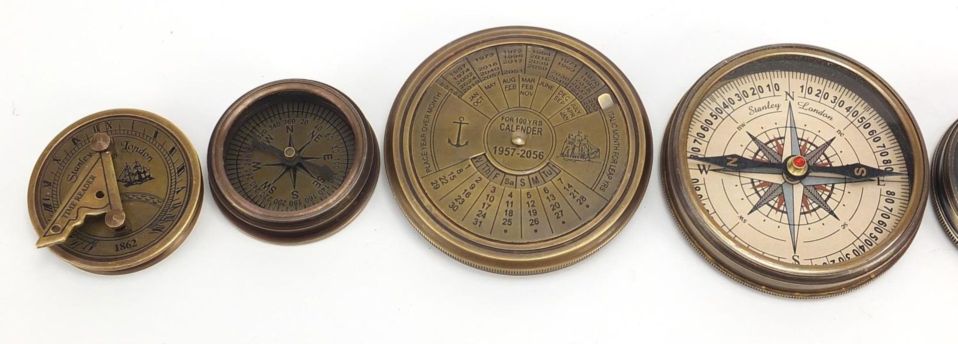 Four brass nautical interest compasses and sun dials, the largest 7.5cm in diameter - Image 2 of 5