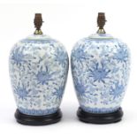Pair of Chinese blue and white porcelain vase and cover table lamps with hardwood stands, each