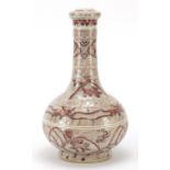 Chinese porcelain iron red vase hand painted with mythical animals amongst flowers, six figure