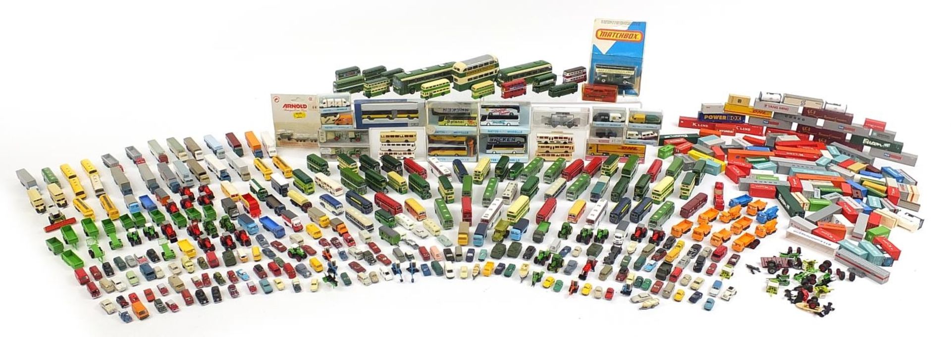 Large collection of N gauge model railway advertising vehicles, freight containers and accessories