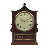 Regency inlaid rosewood pagoda top repeating bracket clock striking on a bell, the circular dial