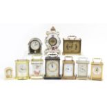 Selection of mantle clocks including a ceramic floral example, Seiko quartz and alabaster the