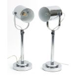 Pair of polished chrome theatre style table lamps, each 49cm high