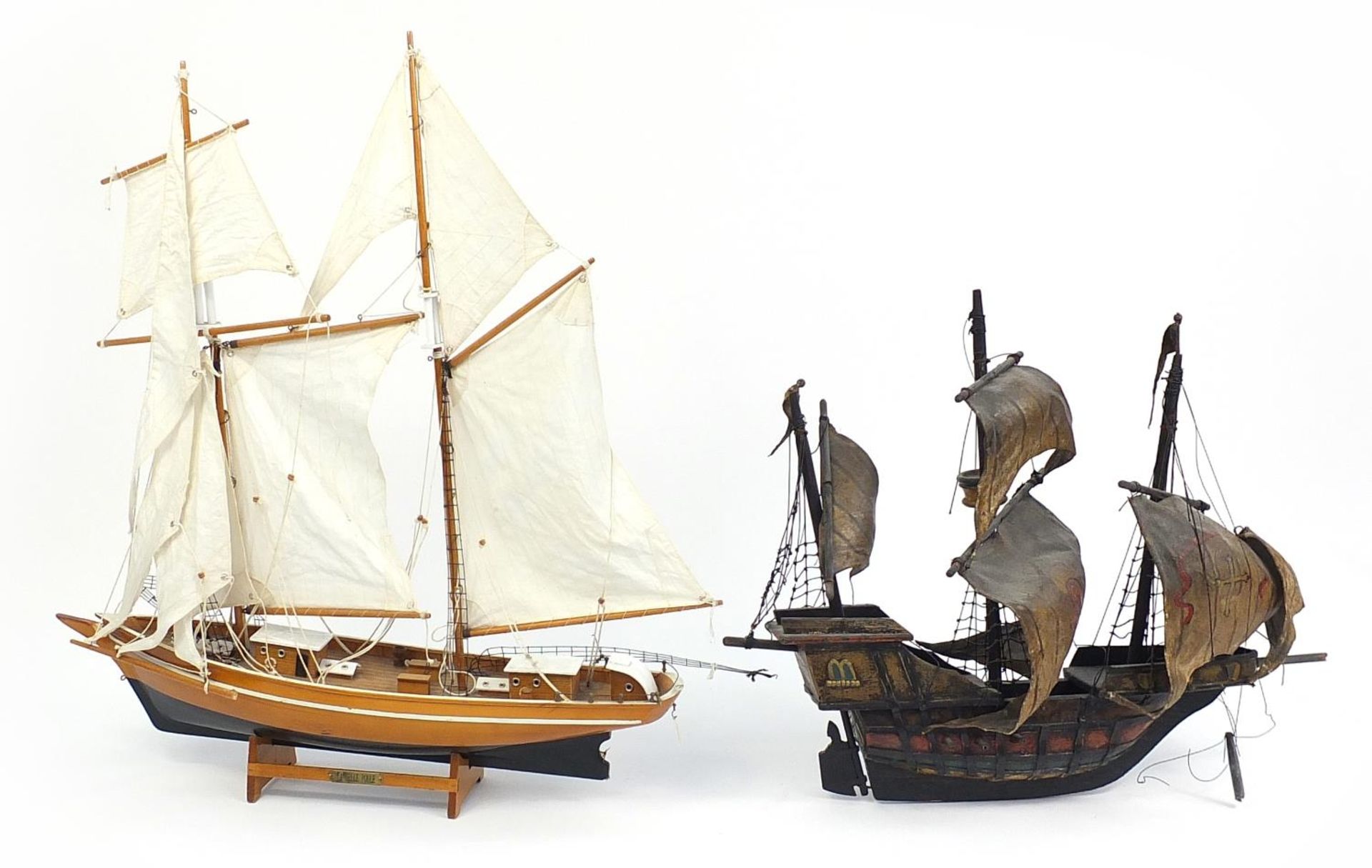 Wooden model of a galleon and wooden yacht with cloth sails, the largest 63cm in length - Image 2 of 2