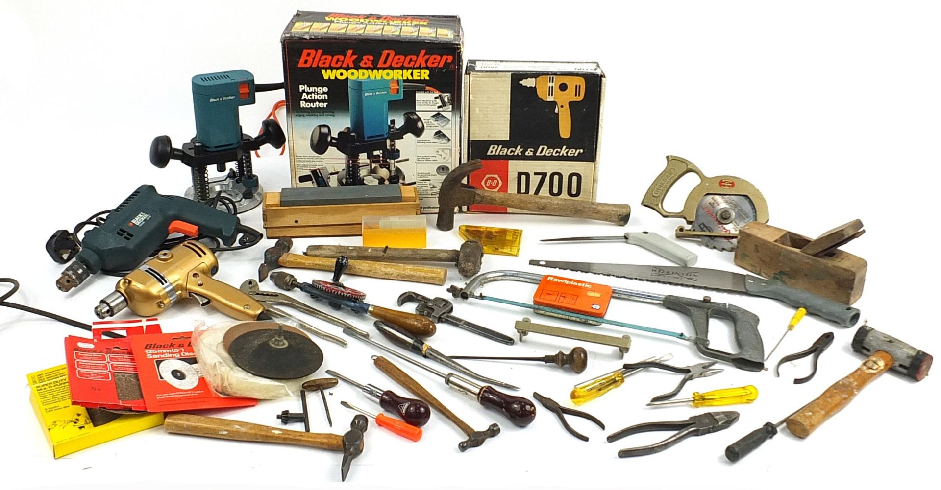 Assorted tools including Black & Decker drills, plunge action router, Wilkinson saw, retro drill