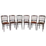 Set of six stained wood stick back chairs with drop in seats, 87cm high