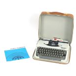 Cased Olympia Splendid 33 retro typewriter