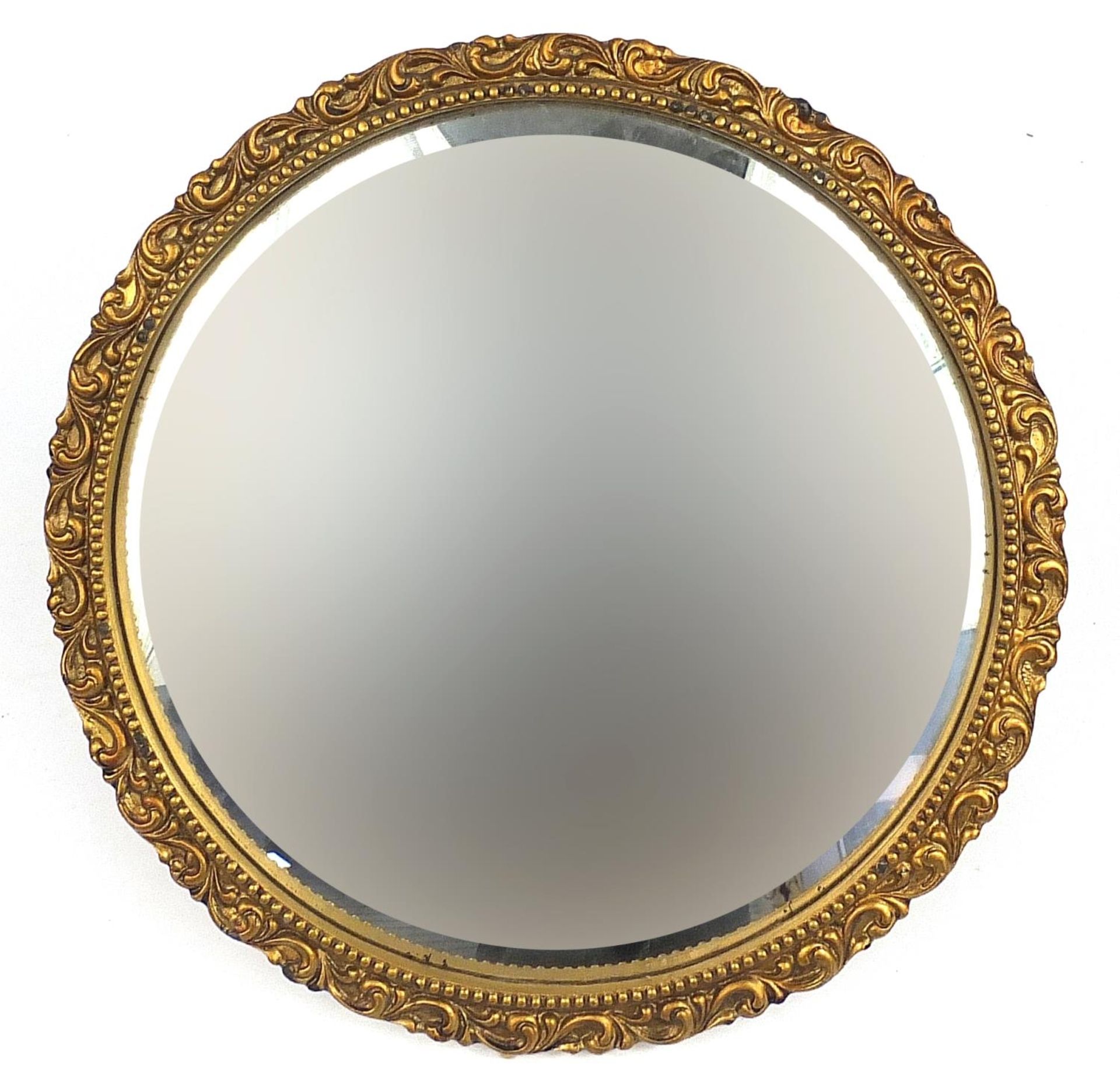 Circular gilt framed convex mirror, 40cm in diameter