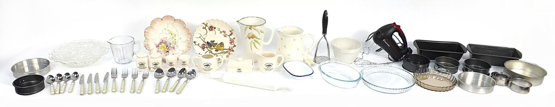 Assorted kitchen and baking items including , ceramic jugs, pudding basins, glass cake flans tin and