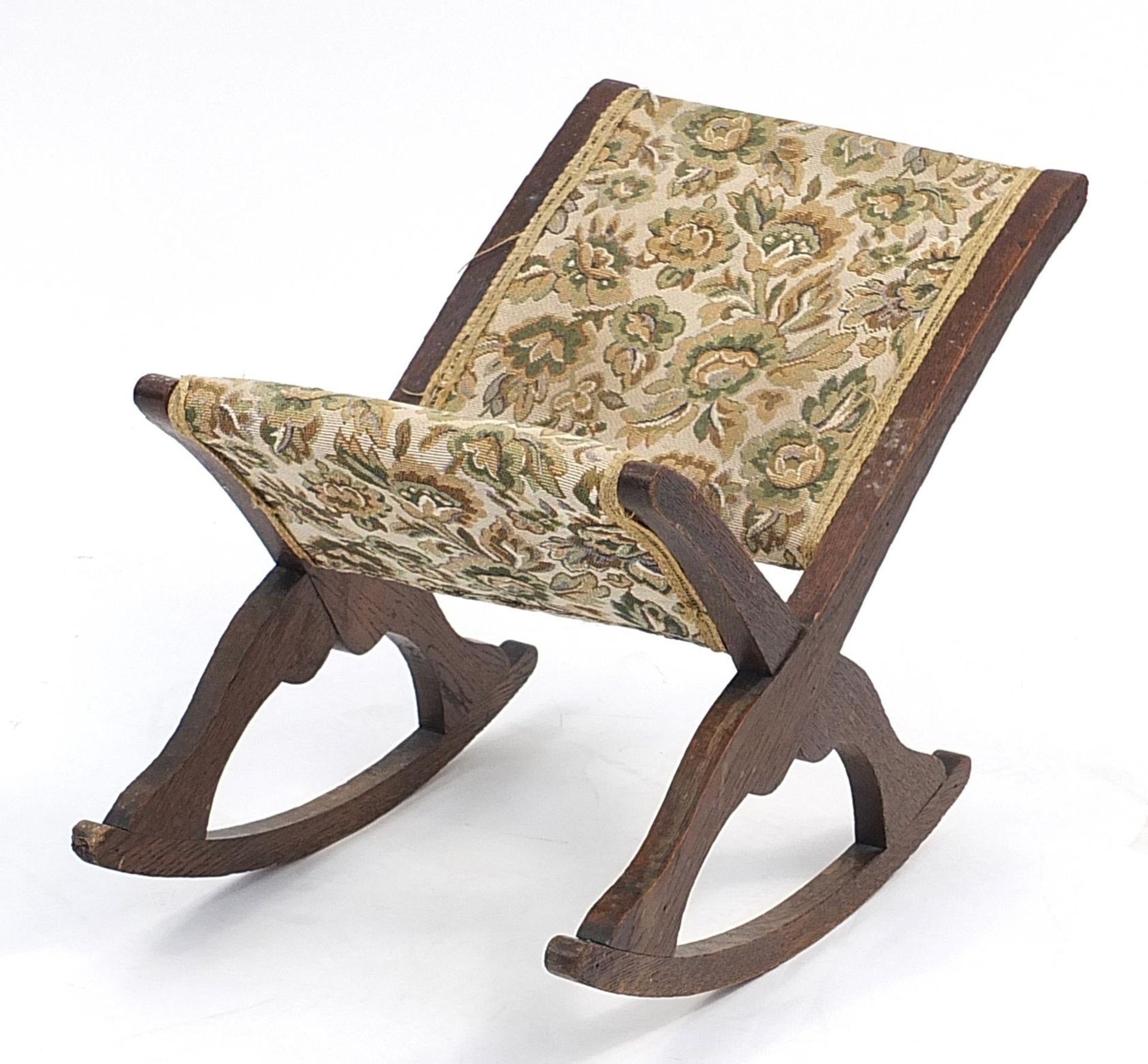 Oak floral upholstered rocking footstool, 60cm high