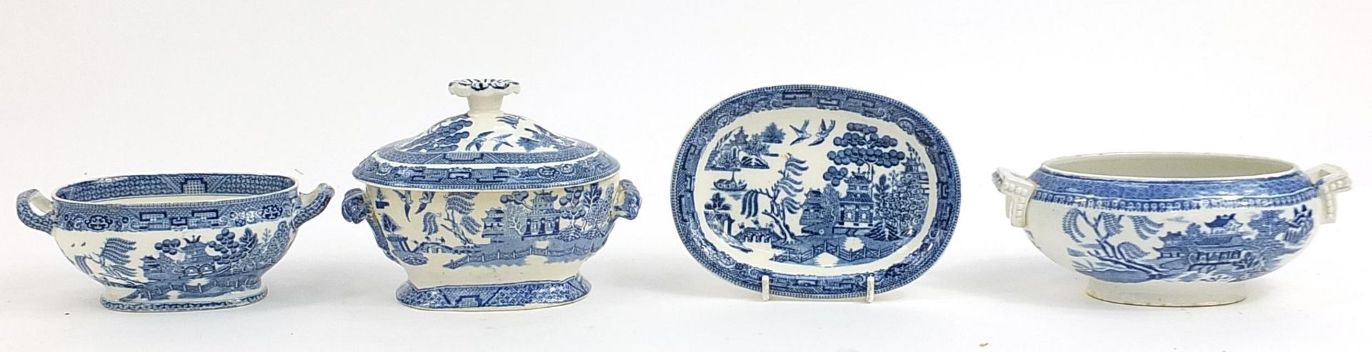 Old blue and white Willow pattern tureens, covers and stands, the largest 20cm wide