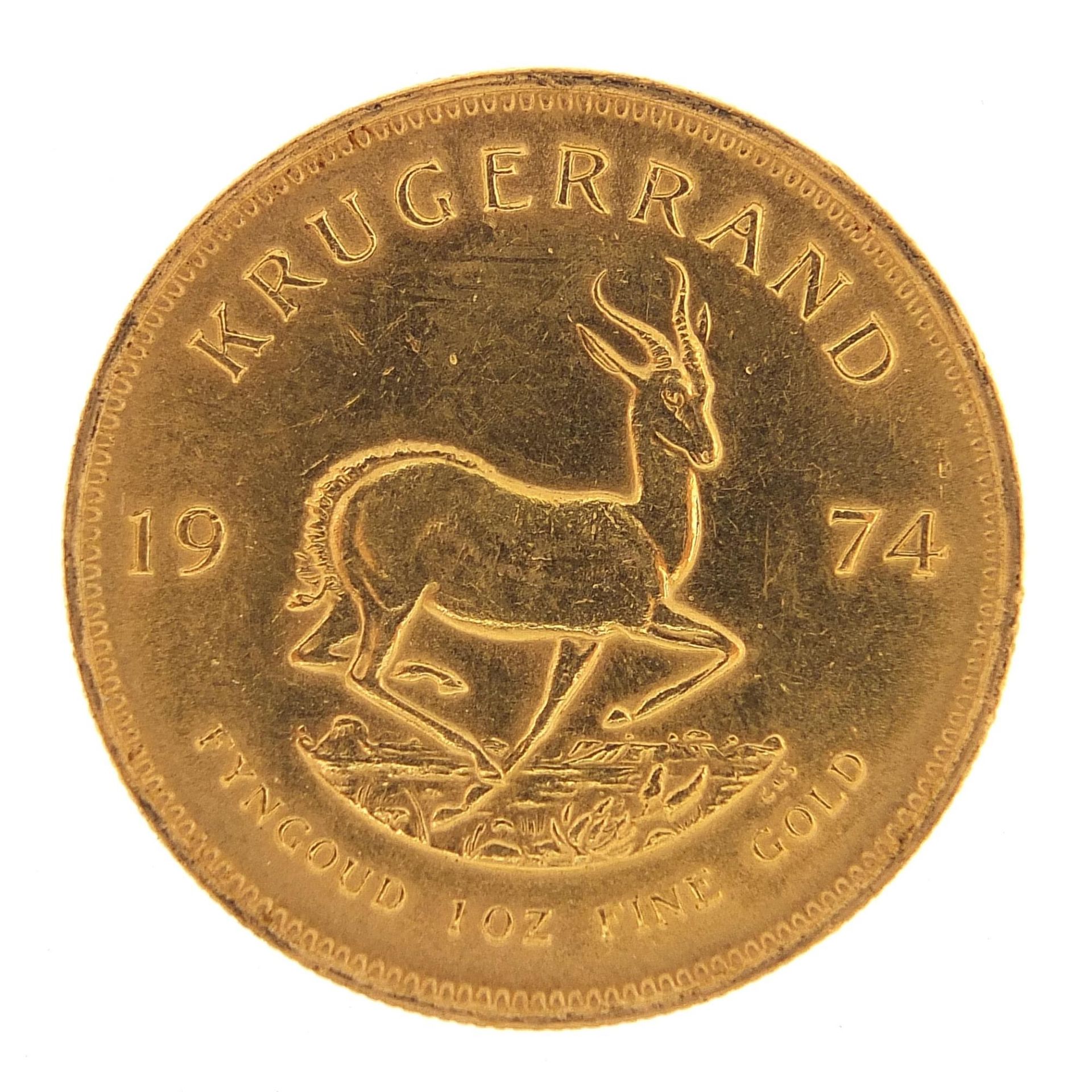 South African 1974 gold krugerrand - this lot is sold without buyer's premium