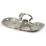 WMF, German Art Nouveau pewter swing meat dish with handle in the form of a nude female, 31cm wide