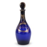 18th/19th century Bristol blue glass decanter with gilt decoration, inscribed Hollands, 23cm high