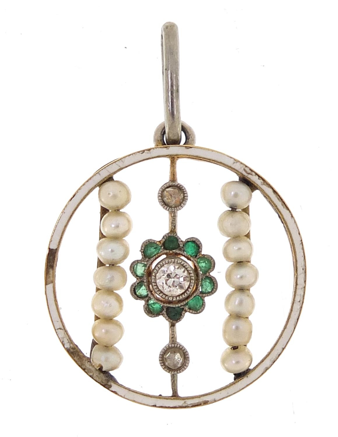 Unmarked gold diamond, emerald, seed pearl and white enamel pendant, 2.8cm high, 1.7g