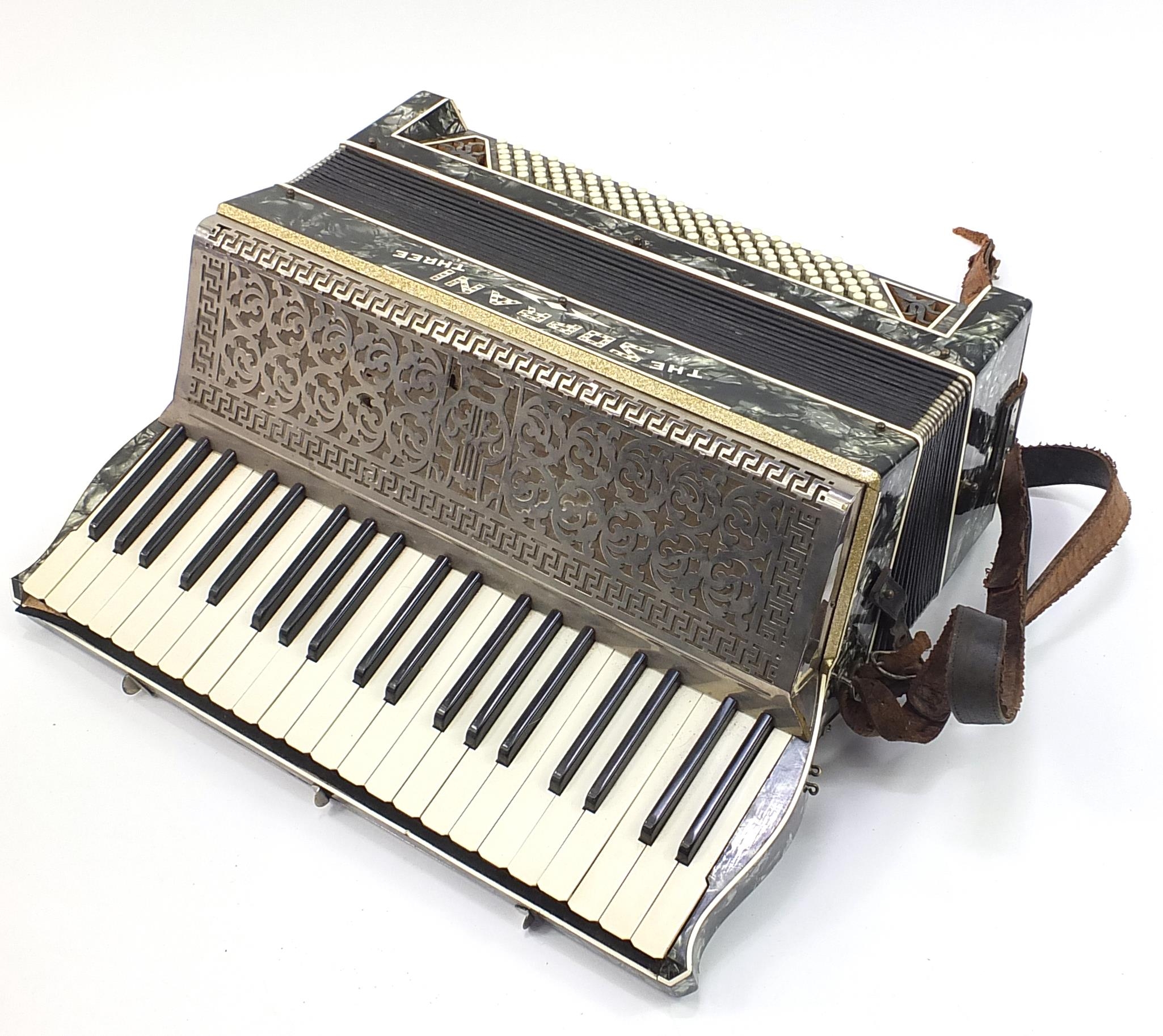 The Soprani Three Italian mother of pearl design accordion housed in protective case, 51.5cm wide