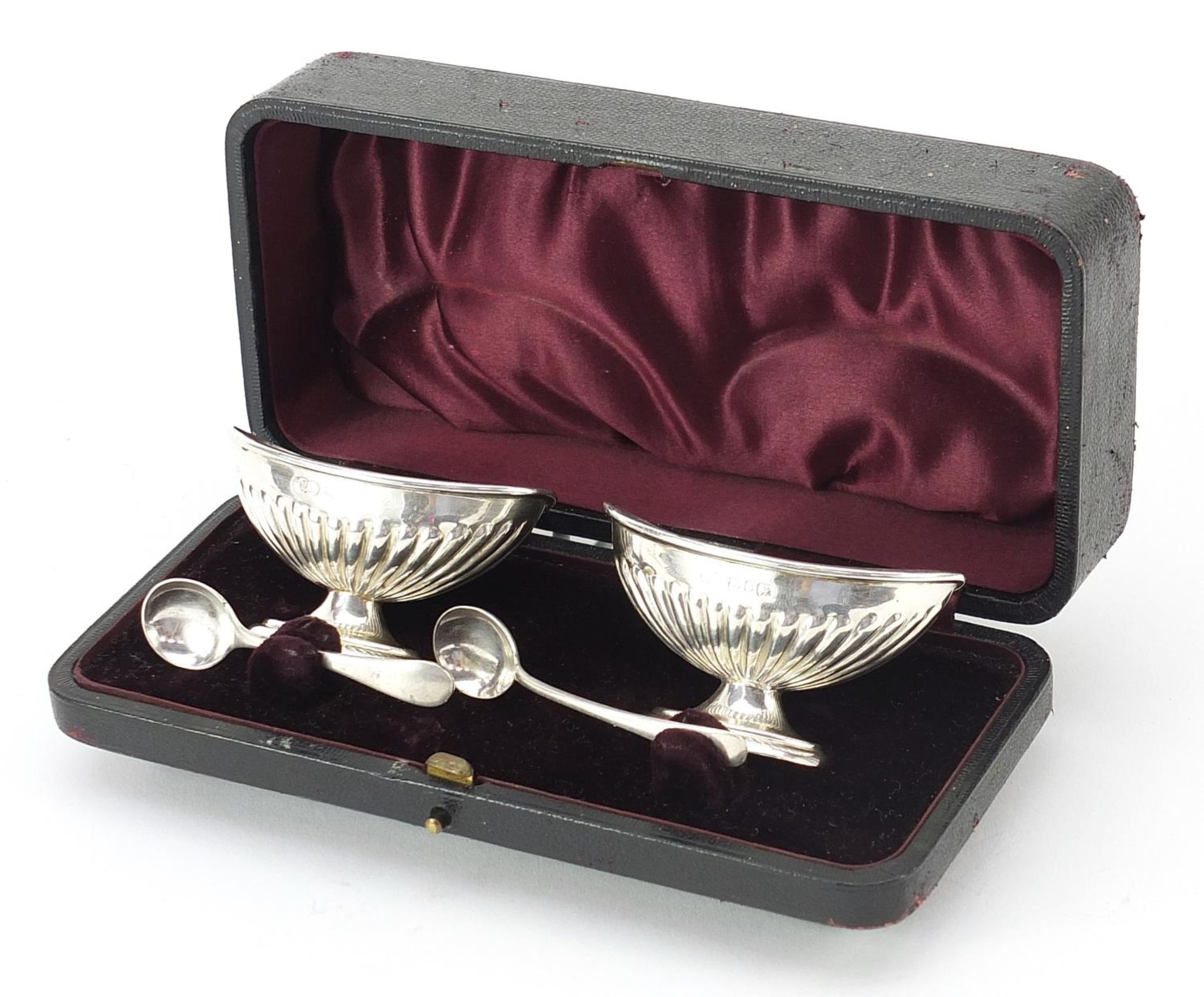 Nathan & Hayes, Pair of Victorian silver salts with a silver spoon and matched silver plated spoon