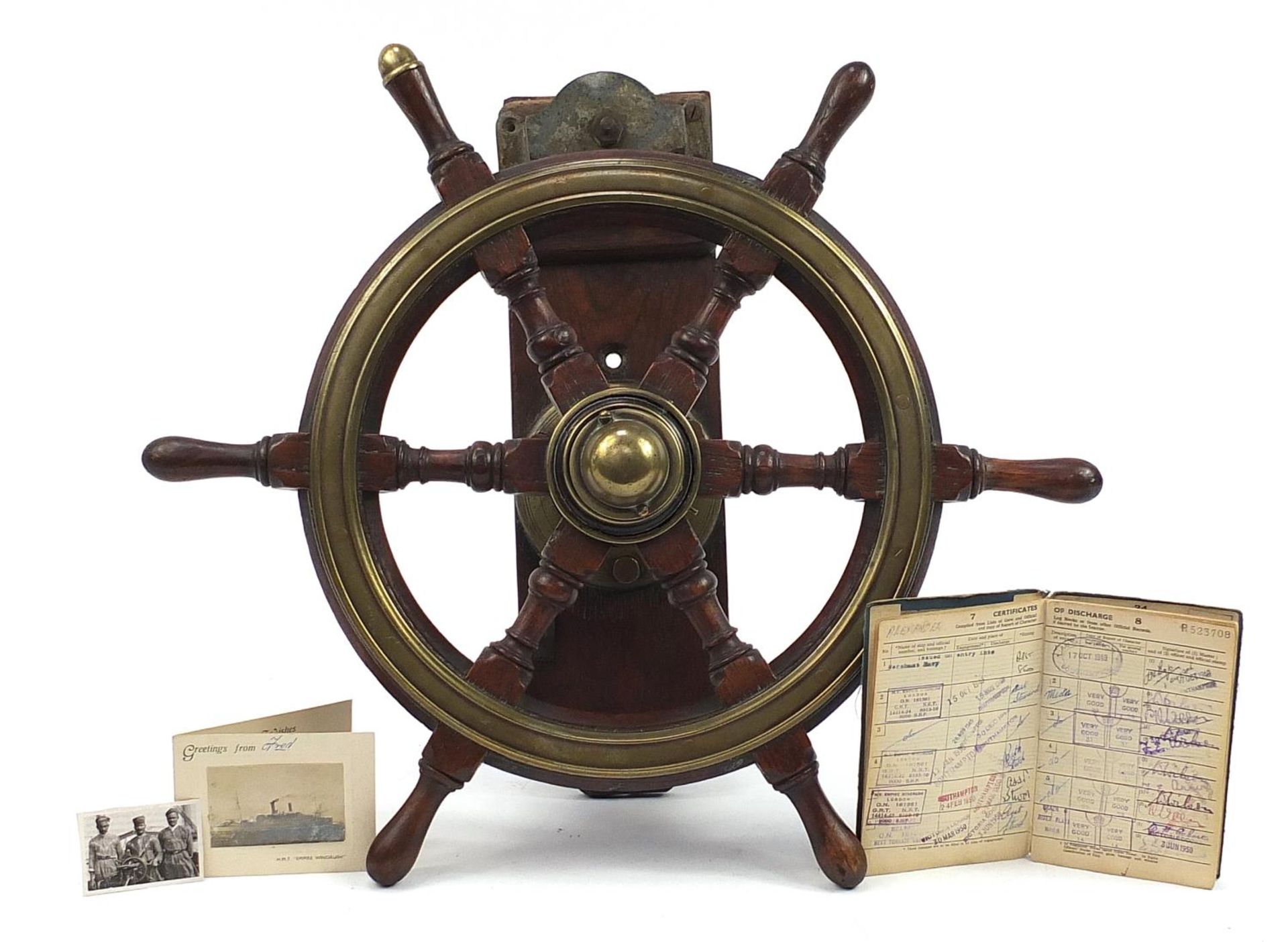 Naval interest hardwood ship's wheel with brass mounts, reputedly from HMT Empire Windrush