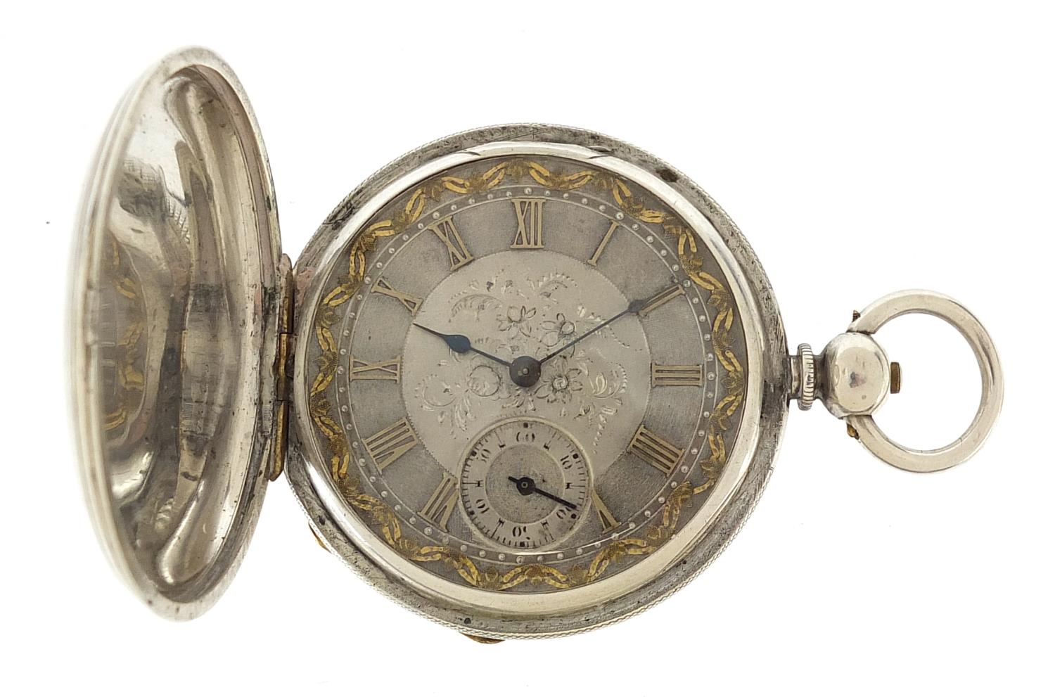 Gentlemen's silver full hunter pocket watch with ornate silvered and gilt dial, 50mm in diameter