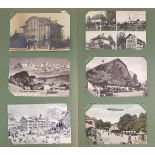 Collection of early 20th century and later social history and topographical postcards arranged in an
