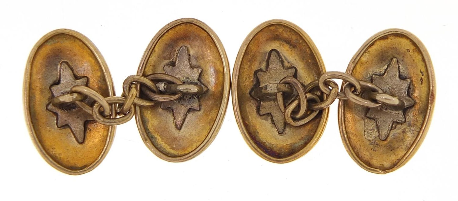 Pair of unmarked gold cufflinks engraved with flowers, (tests as 9ct gold) 1.5cm in length, 3.5g - Image 2 of 2