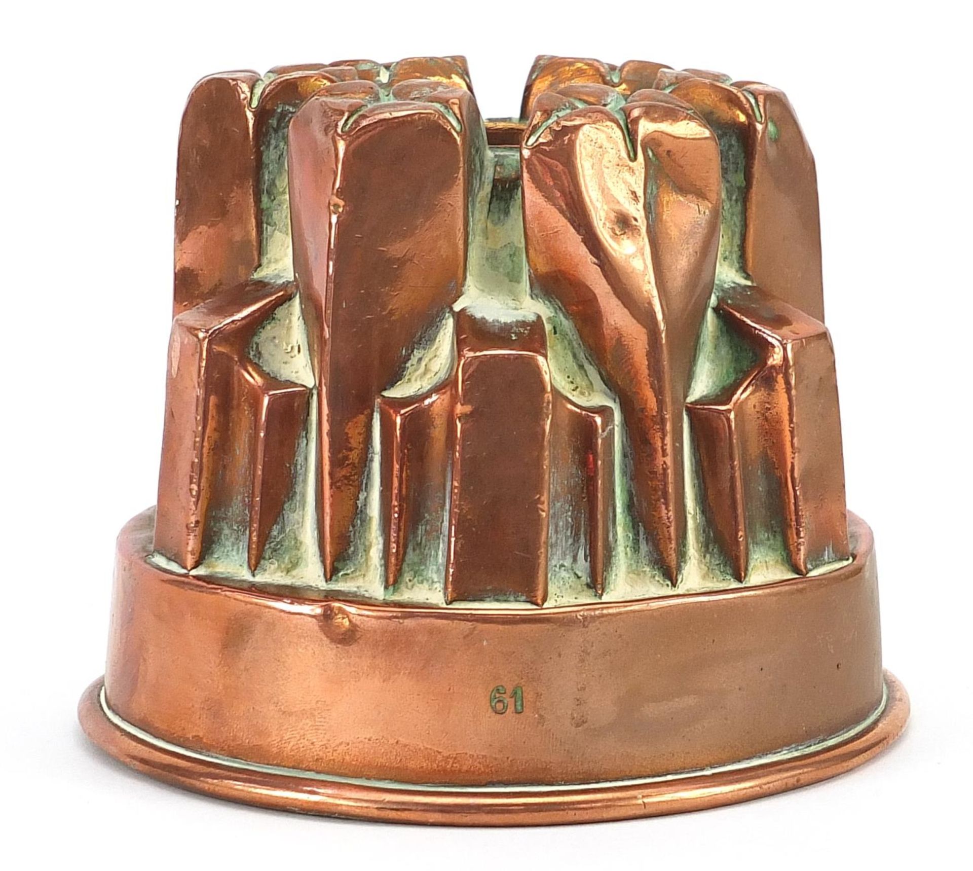 Victorian copper jelly mould numbered 61, 11cm high