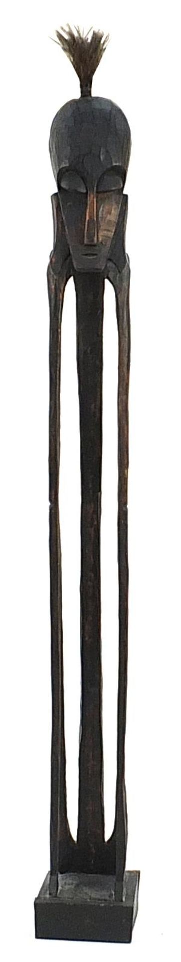 Large floor standing carved wood tribal figure, 215cm high