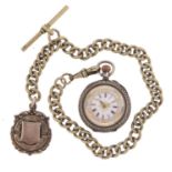 Ladies silver open face pocket watch with enamelled dial on a white metal watch chain with silver