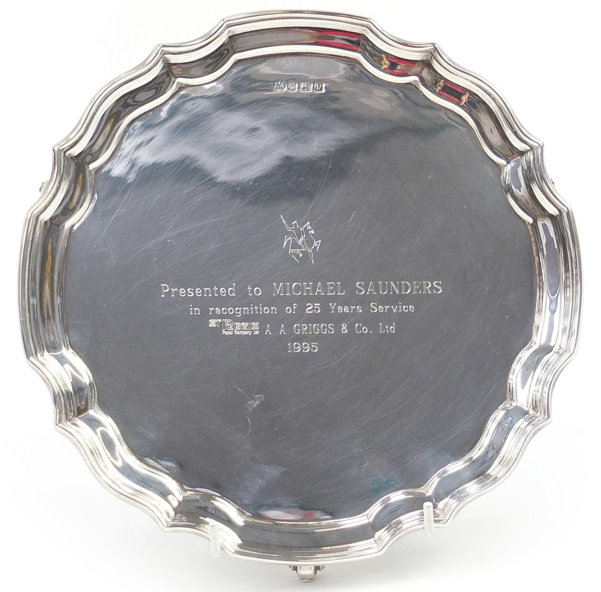 Elkington & Co Ltd, Elizabeth II circular silver salver raised on three scrolled feet with - Image 3 of 5