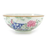 Chinese porcelain bowl hand painted with a bird of paradise amongst flowers, six figure character