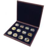 Set of twelve World War II proof commemorative coins by The Windsor Mint with box and certificate