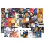 Vinyl LP records including Status Quo, U2, The Moody Blues, Stevie Wonder, The Rolling Stones and