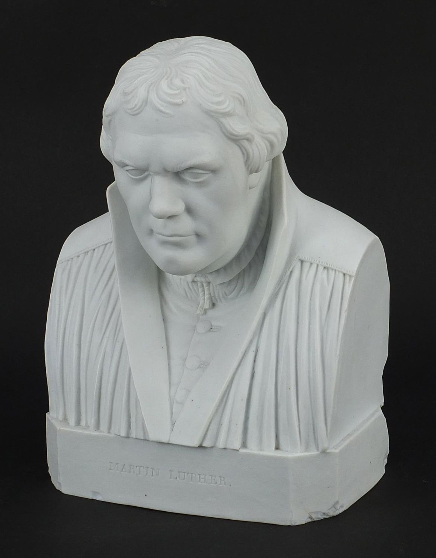 19th century continental parian ware bust of Martin Luther, blue crossed sword marks and impressed